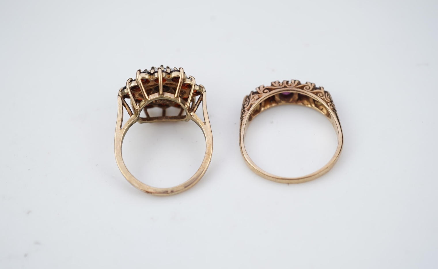 Two 19th century white metal mounted horn snuff mulls, one engraved 'John Calder', the other with inset tiger's eye quartz cabochon, both a.f., largest 83mm.